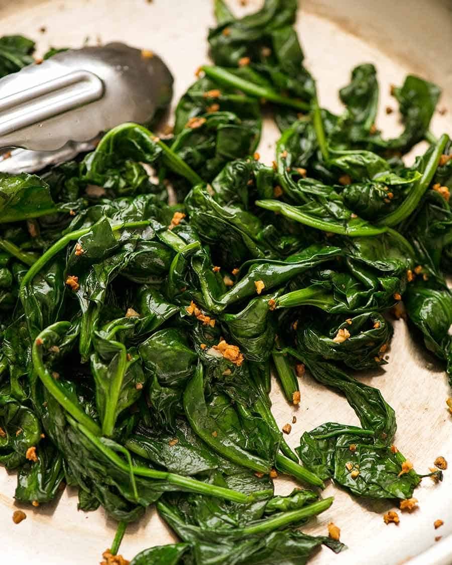 Garlic Sautéed Spinach in a skillet, ready to be served